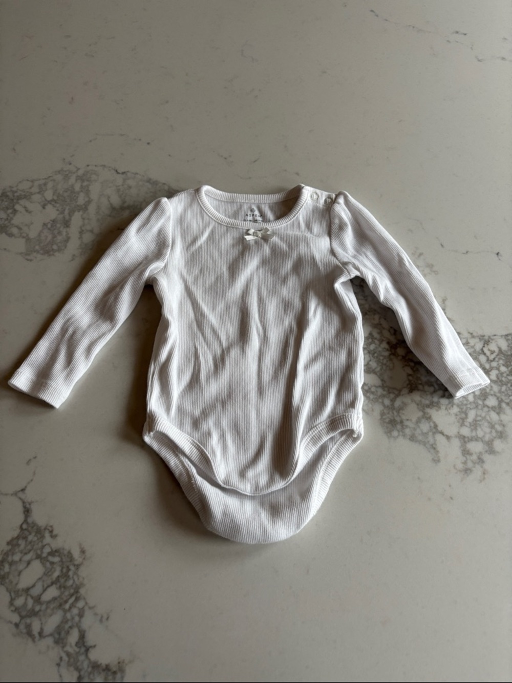 Long-Sleeve White Ribbed Baby Bodysuit